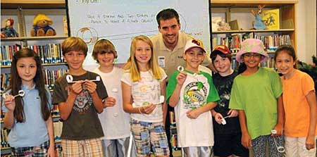 Suarez with students