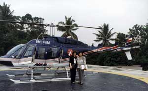 Searching for sites for the MUST campus, 1997.  (l to r) Patricia Vargas, Assistant Director, TDP and Datin Munira Salinger, Project Coordinator, MUST Ehsan Foundation.