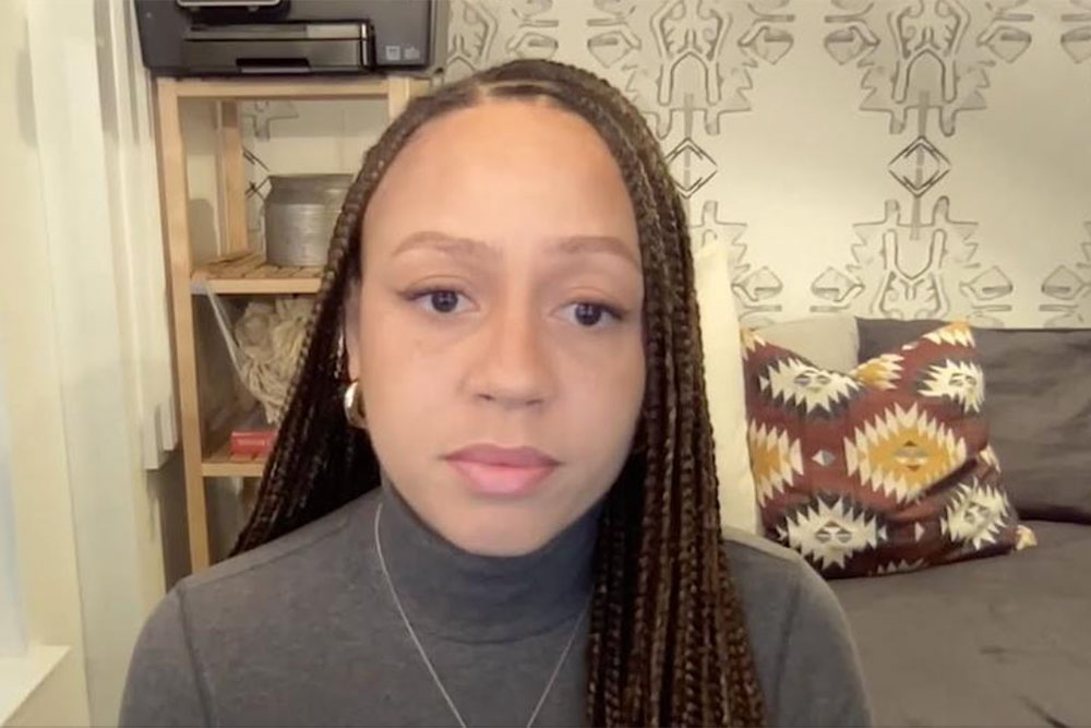 headshot of black female in an office space