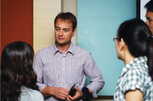 Mr Tony Boatman chatting with participants at the talk on The Climate Project